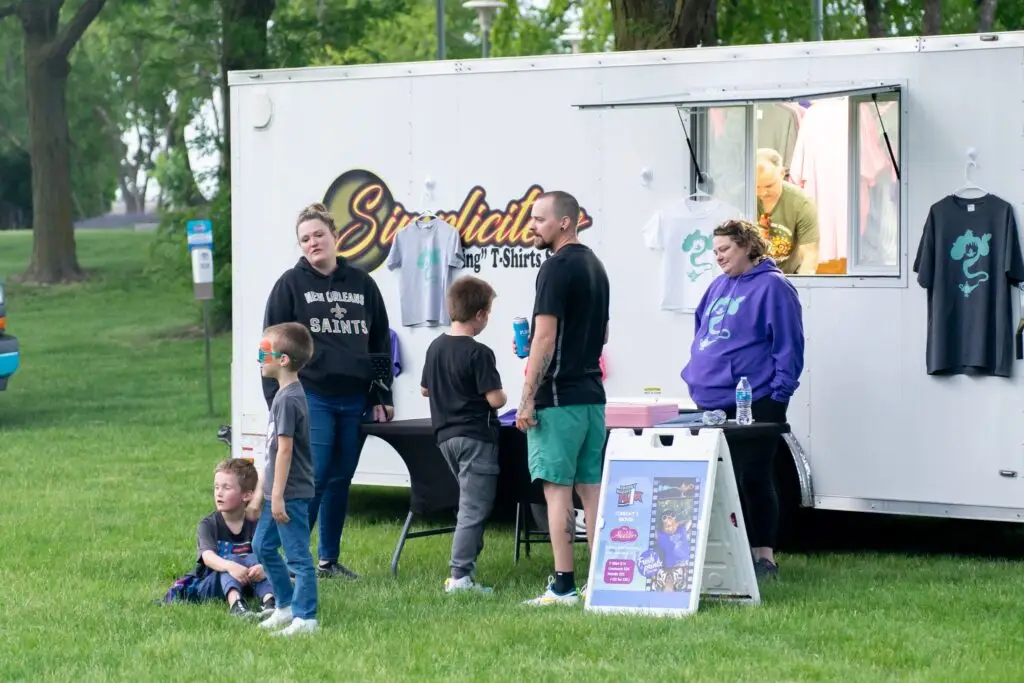 julie interacting with customers at friday night flix